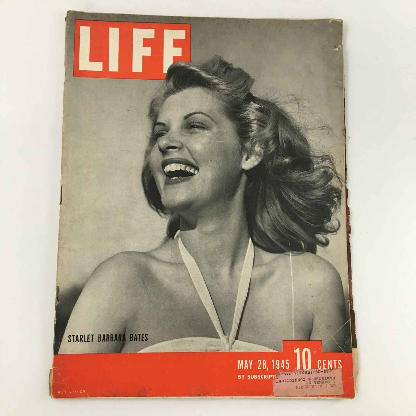 VTG Life Magazine May 28 1945 cover featuring starlet Barbara Bates, showcasing a vintage photograph of a smiling woman with wavy hair, emphasizing the glamour of the 1940s.