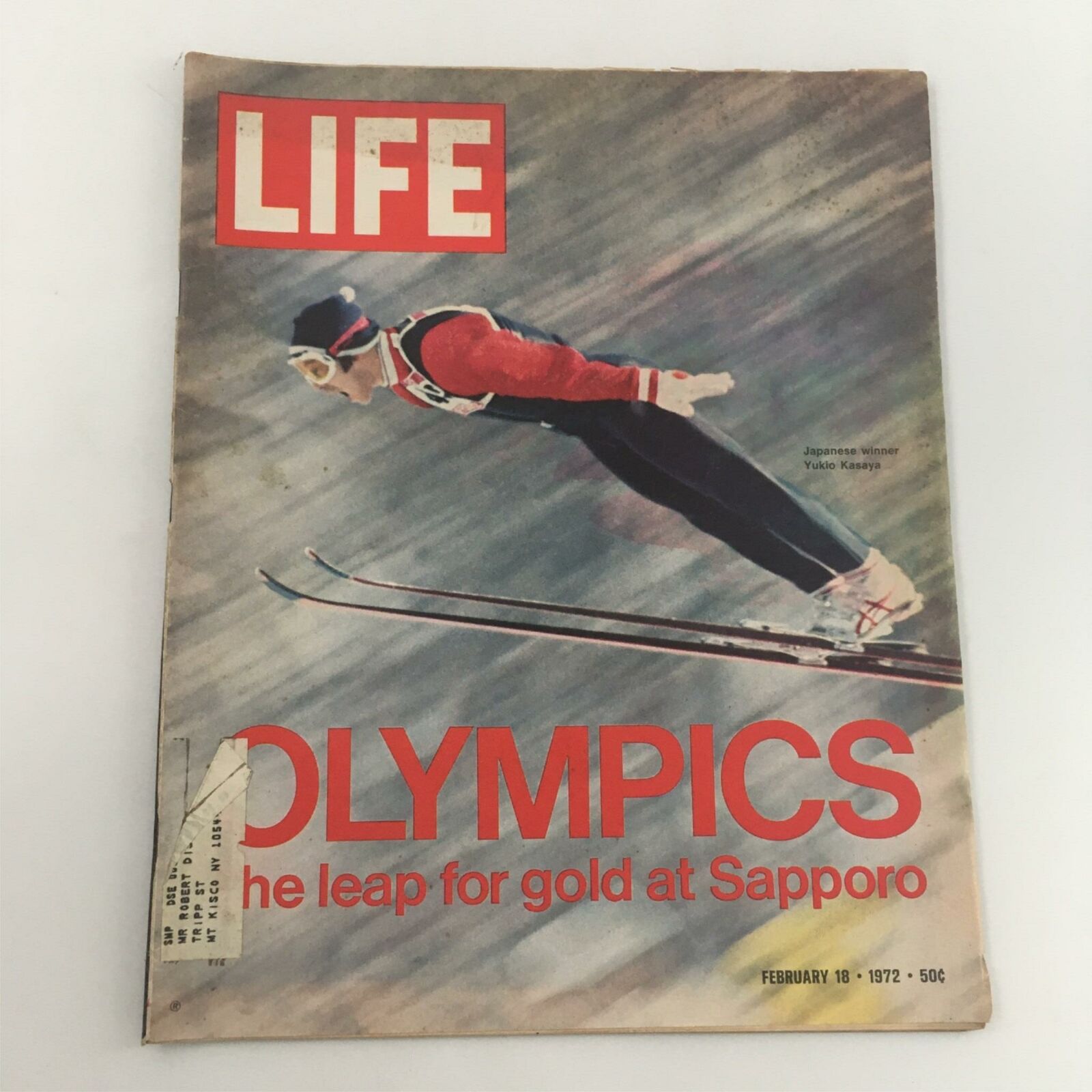 Vintage Life Magazine cover from February 18, 1972, featuring Olympic ski jumper Yukio Kasaya, capturing the excitement of the Winter Olympics in Sapporo.