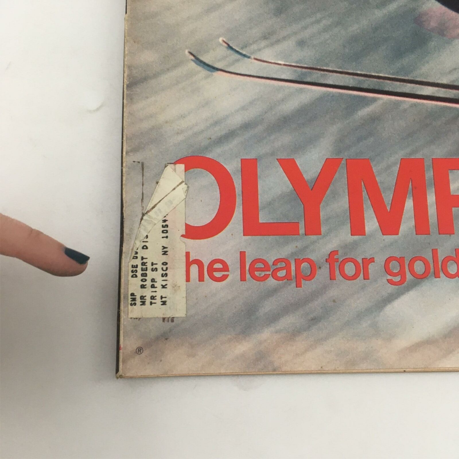 Close-up of the corner of the February 18, 1972 VTG Life Magazine featuring an address label, highlighting the Olympic theme and the coverage of Japanese winner Yukio Kasaya's achievements.