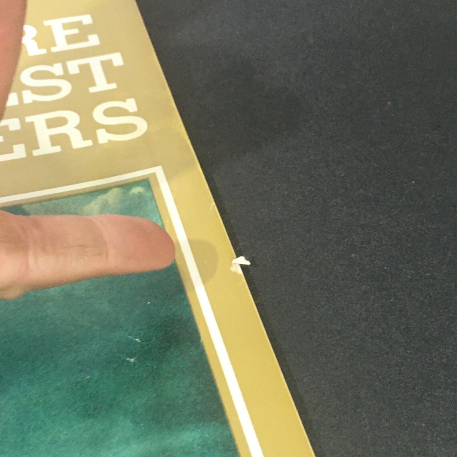 Close-up view of the edge of a VTG Life Magazine from July 9, 1971 showing minor wear with a visible small rip, highlighting its vintage charm and condition.