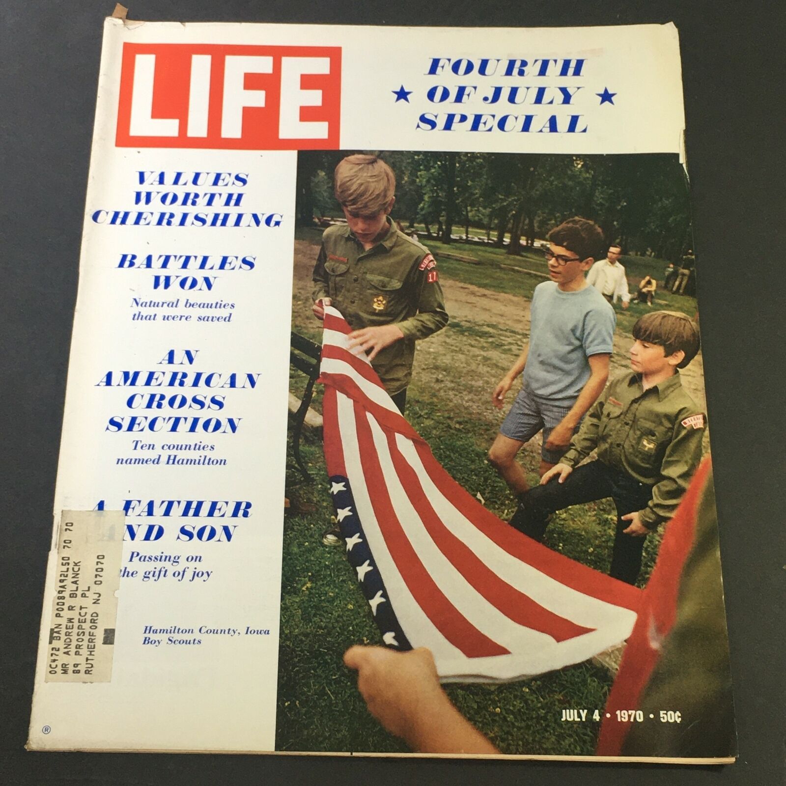 Cover of VTG Life Magazine July 4 1970 - Values Worth Cherishing, featuring children holding an American flag during a Fourth of July celebration, with text highlighting key articles and themes of the issue.