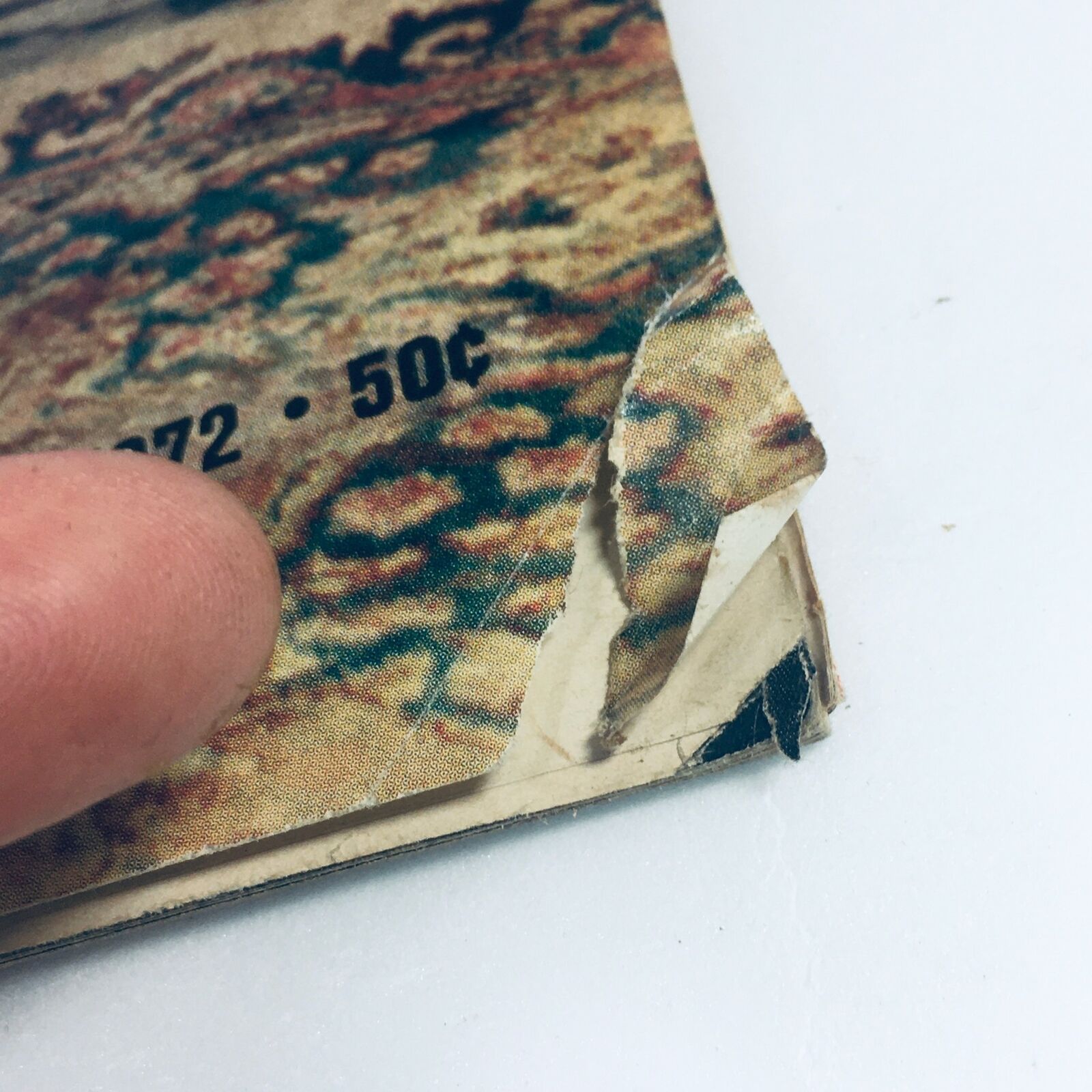 Close-up image of the VTG Life Magazine November 3, 1972 cover showing a corner with minor damage, highlighting its vintage characteristics and authenticity.