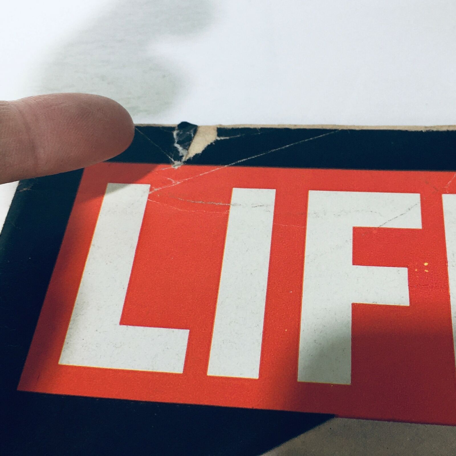 Close-up of the top corner of the June 12, 1970, VTG Life Magazine, highlighting minor wear and tear on the cover with the prominent 'LIFE' title.