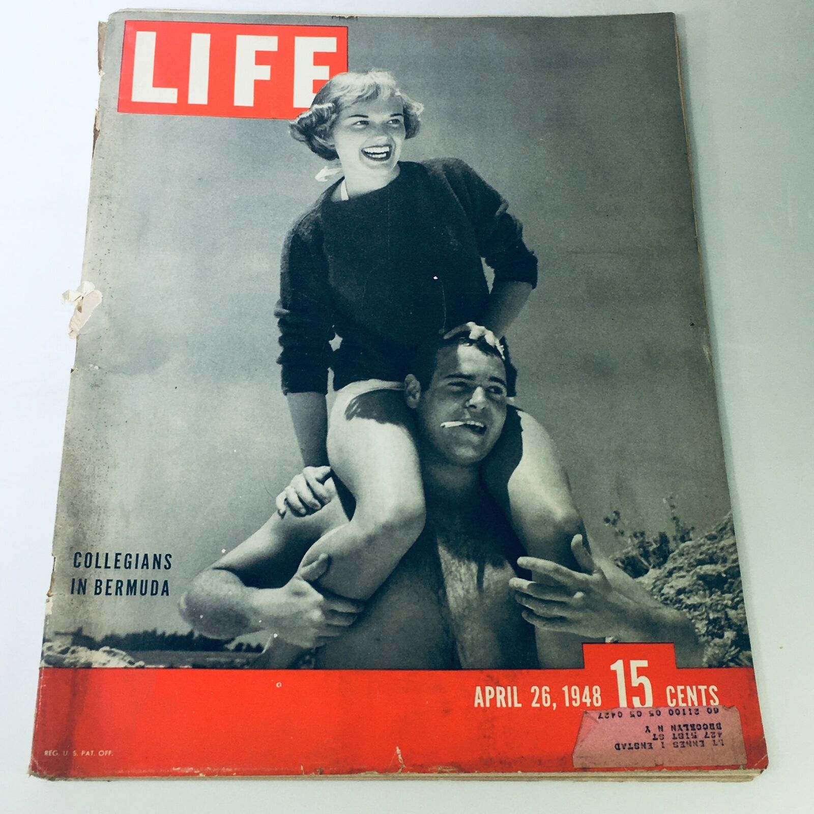 Cover of VTG Life Magazine April 26 1948 featuring Collegians in Bermuda, showcasing a young couple on a beach, embodying the carefree spirit of the era.