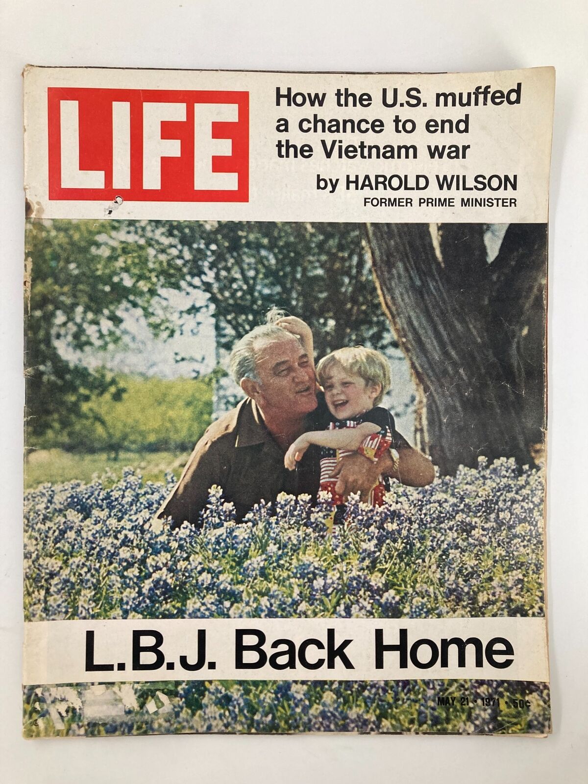 Cover of VTG Life Magazine dated May 21, 1971, featuring Lyndon B. Johnson smiling with his grandson amidst bluebonnets, titled 'L.B.J. Back Home.'