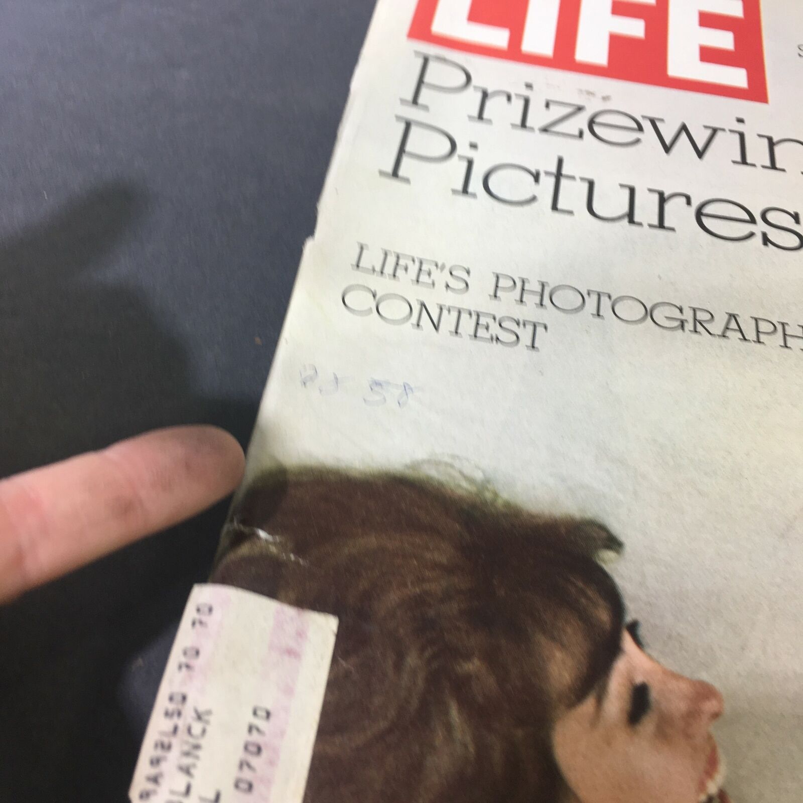 Detailed view of the top of the vintage Life Magazine cover from December 25, 1970, displaying the title 'Life's Photography Contest Prizewinning' and handwritten notes.