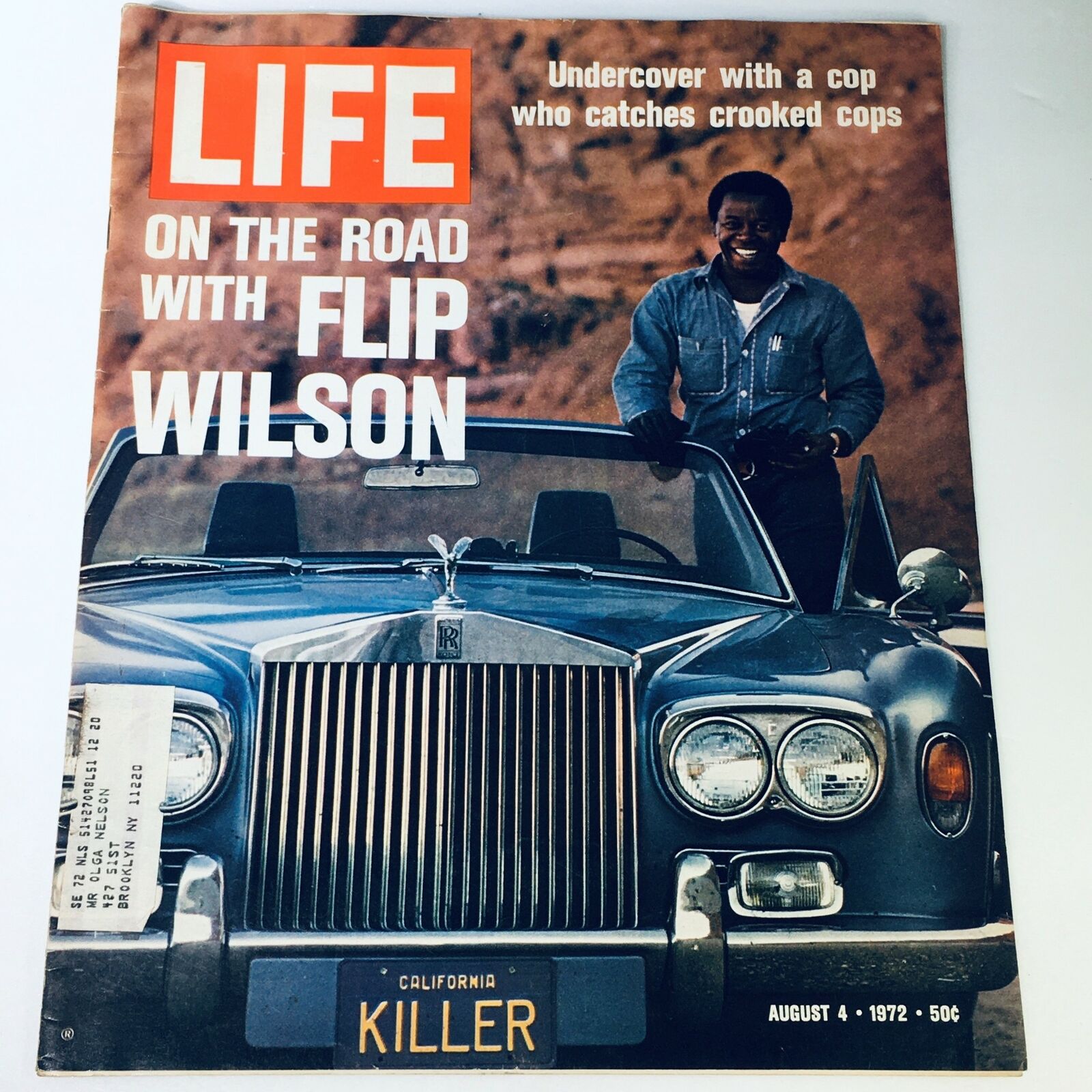 Cover of VTG Life Magazine from August 4, 1972, featuring 'On The Road with Flip Wilson' and a story about undercover cops, showcasing a man beside a blue Rolls Royce.