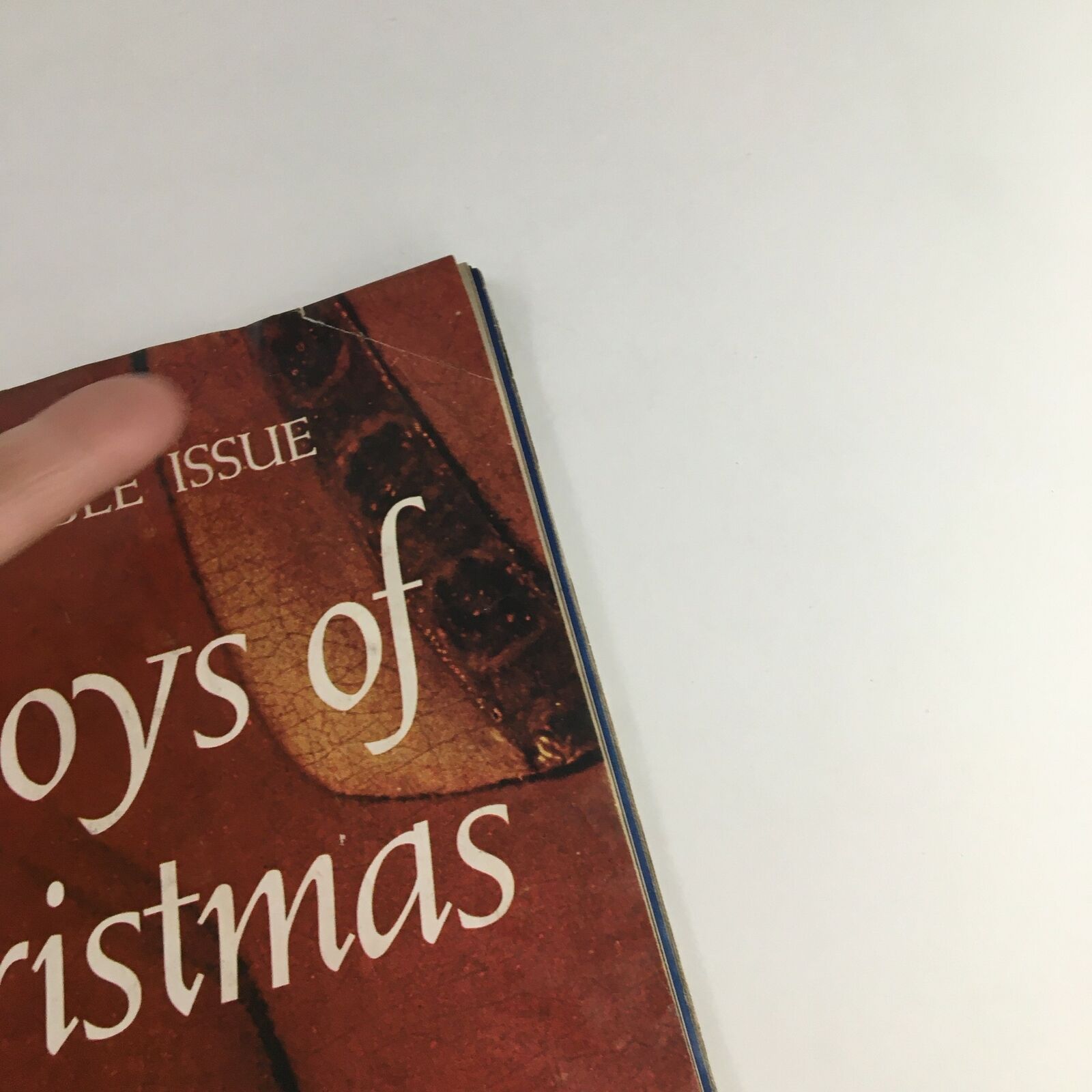 Detail of the cover of Life Magazine December 15, 1972, Special Double Issue 'Joys of Christmas' showing a crease and the magazine's title prominently.