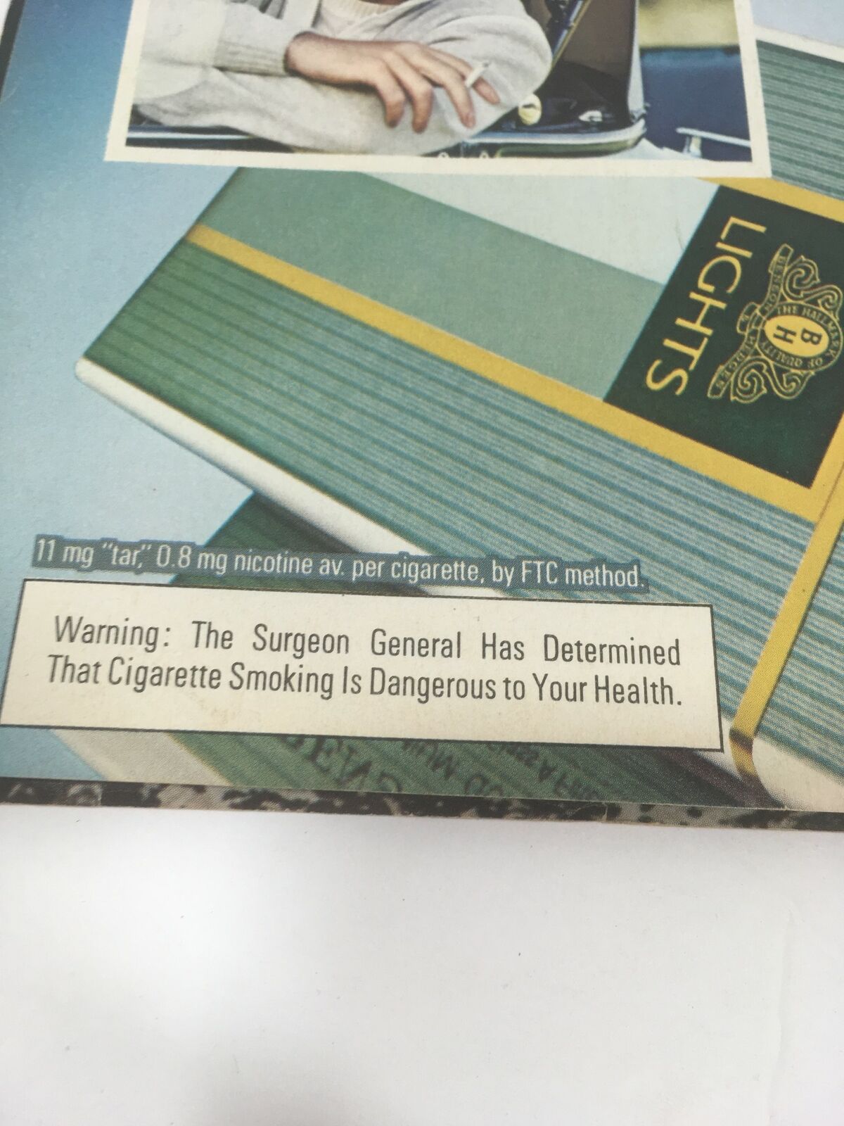 Detail of the Benson & Hedges Lights advertisement in the 1979 Time Magazine: Bravo Pavarotti! Opera's Golden Tenor, including health warning.