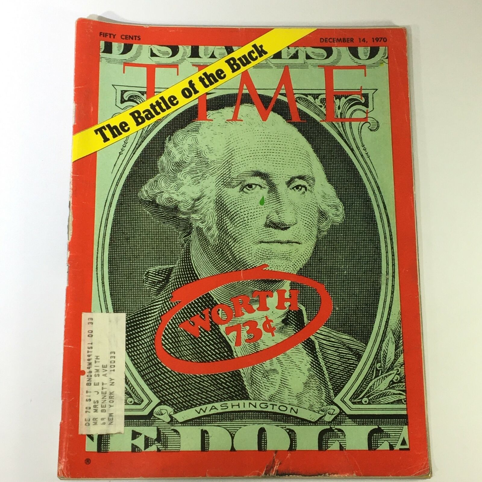 Vintage Time Magazine from December 14, 1970, featuring the cover story "The Battle of the Buck Worth 73 Cents" with a portrait of George Washington and eye-catching red graphics.