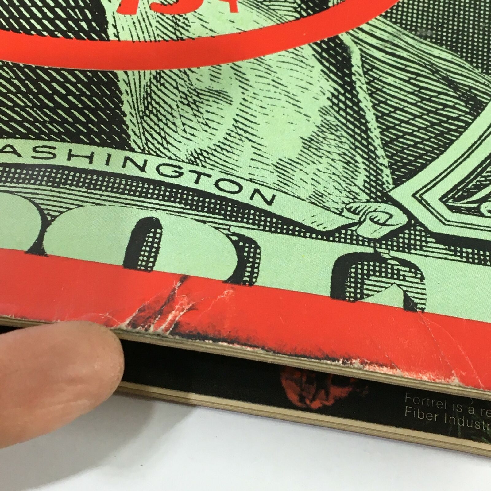 Close-up detail of the vintage Time Magazine cover showing wear and tear, highlighting the text "Worth 73¢" and the edge wear, showcasing the magazine's vintage character.