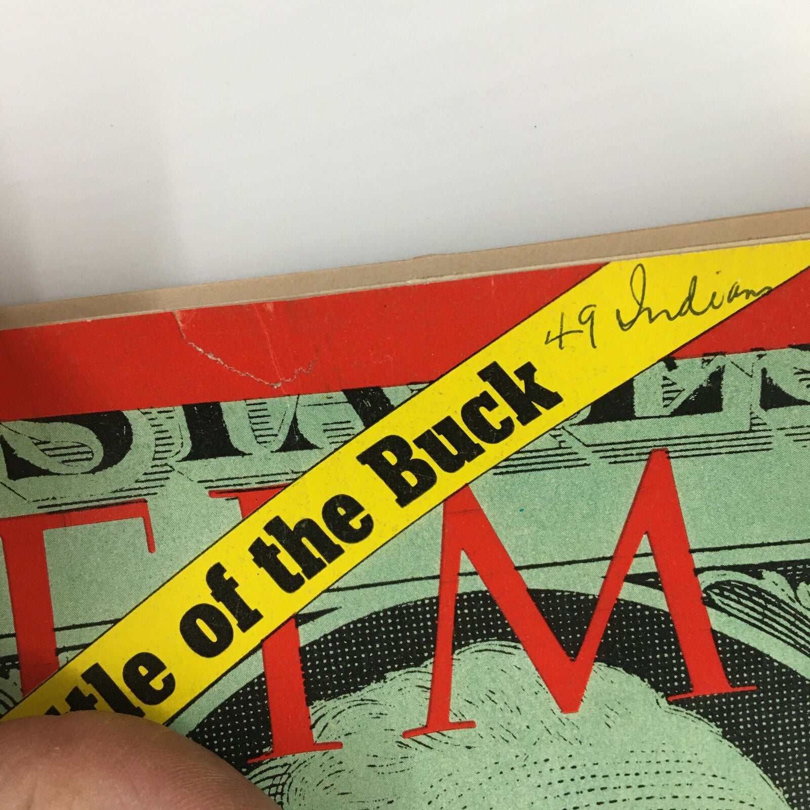 Detail of the top corner of the VTG Time Magazine December 14 1970 cover, showing the headline 'The Battle of the Buck' and a small handwritten note.