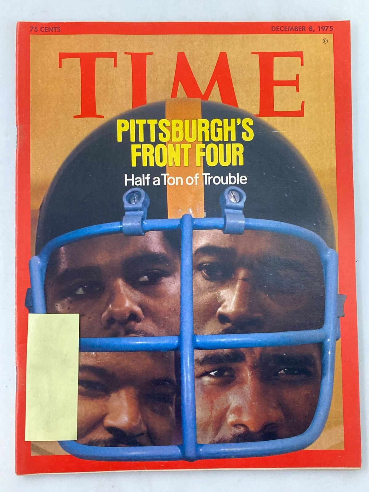 Vintage Time Magazine cover from December 8, 1975 featuring the story 'Pittsburgh's Front Four: Half a Ton of Trouble' showcasing iconic NFL players' faces behind a football helmet cage.