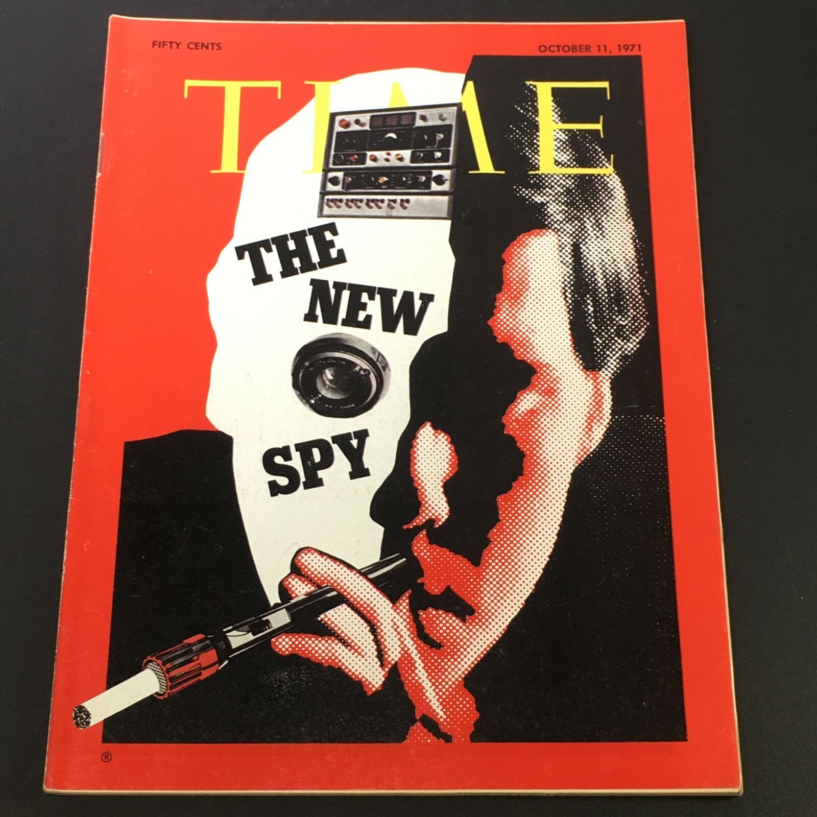 Cover of VTG Time Magazine dated October 11, 1971, featuring the title 'The New Spy' with an illustration of a spy silhouette and camera, highlighting Lady Amalia Fleming.