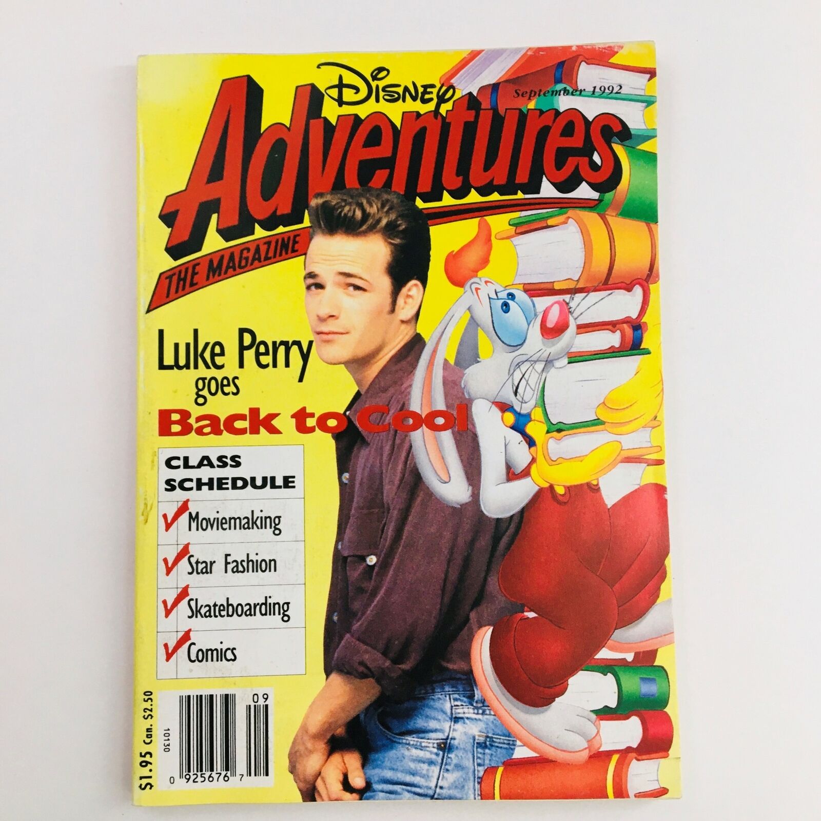 Disney Adventures Magazine from September 1992 featuring Luke Perry on the cover. The magazine highlights the theme 'Back to Cool' with vibrant illustrations and fun content for kids, showcasing pop culture trends of the early '90s.