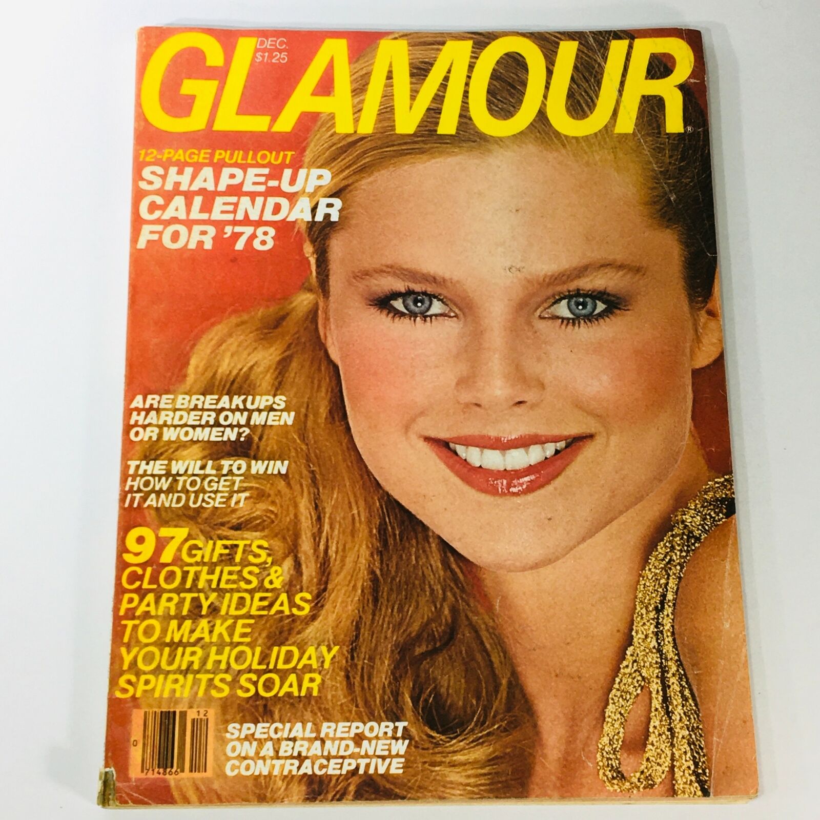 VTG Glamour Magazine December 1977 featuring Christie Brinkley on the cover with a Shape-Up Calendar pull-out. The cover highlights vibrant fashion trends of the late 1970s.