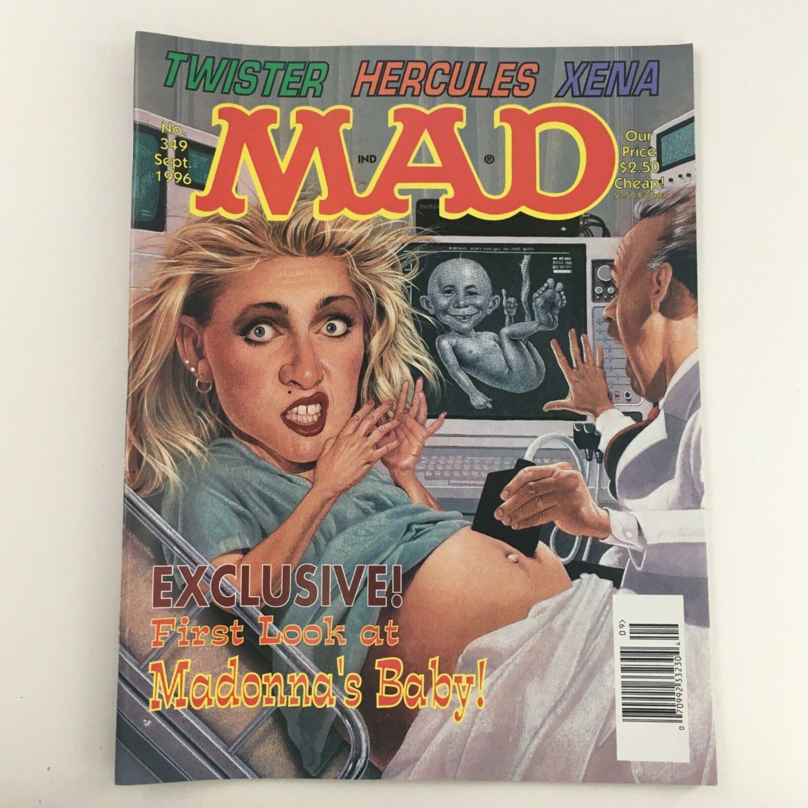 Cover of Mad Magazine September 1996 No. 349 featuring a caricature of a shocked woman, humorously depicting a first look at Madonna's baby. The cover includes colorful graphics and bold text highlighting the magazine's comedic style.