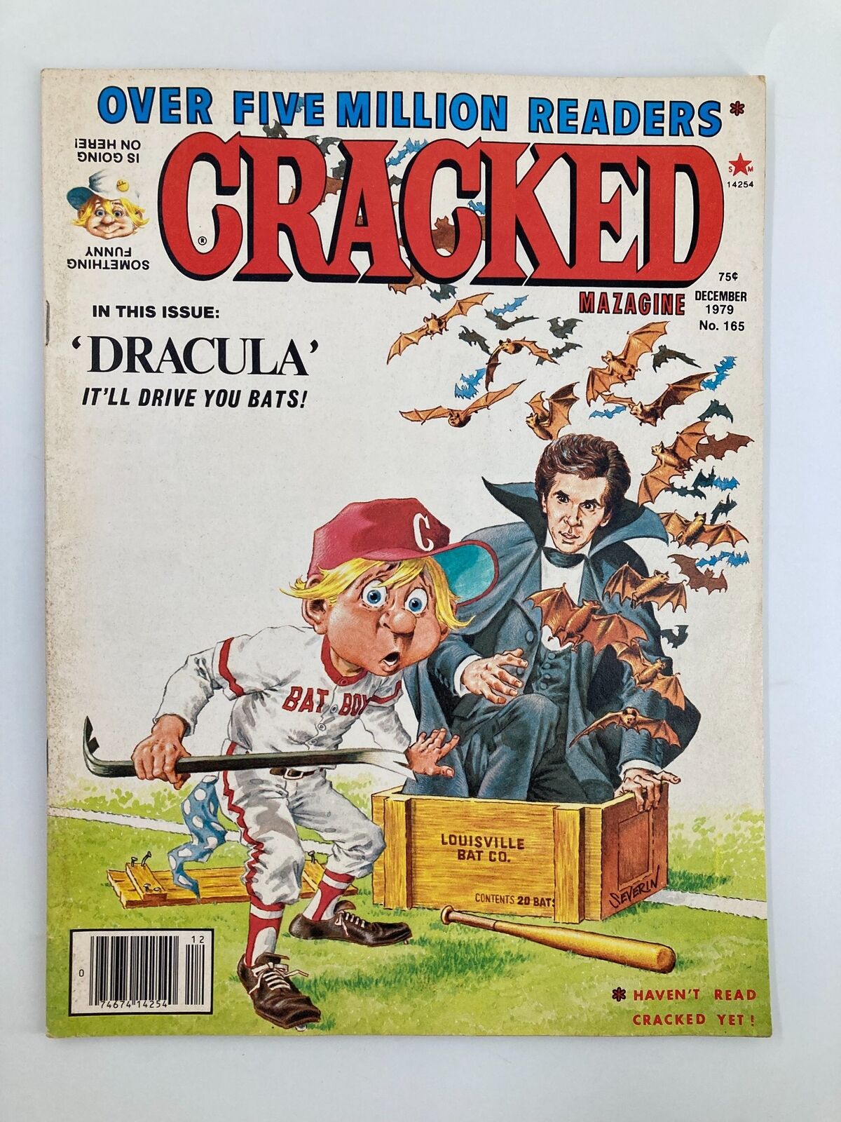 Cracked Humor Magazine December 1979 No. 165 featuring a humorous illustration of a boy in a baseball uniform holding a bat with a surprised expression as bats fly around him and Count Dracula in the background. The cover reads 'Dracula - It'll Drive You Bats!'. This vintage magazine is in Fine condition with a grade of 6.0.
