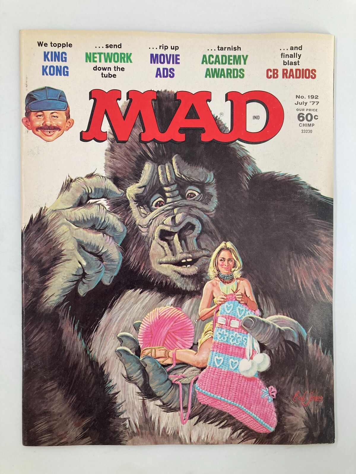Cover of Mad Magazine July 1977 No. 192 featuring a parody illustration influenced by King Kong, showcasing a woman in a knitted outfit while King Kong holds her in his hand, with text highlighting themes of movies and CB radios.
