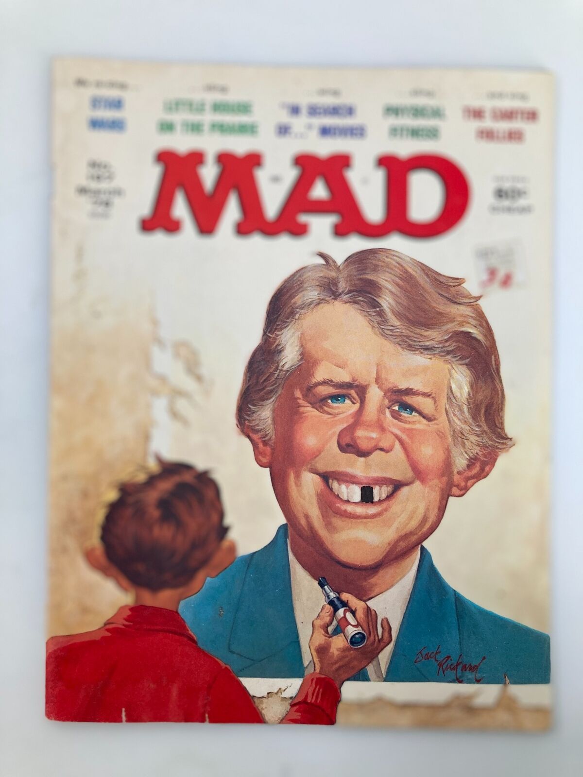 Cover of Mad Magazine March 1978, No. 197 featuring a humorous illustration of Jimmy Carter, depicting a smiling caricature with a boy drawing on his suit. The magazine is rated Good (GD) with visible wear and signs of use.