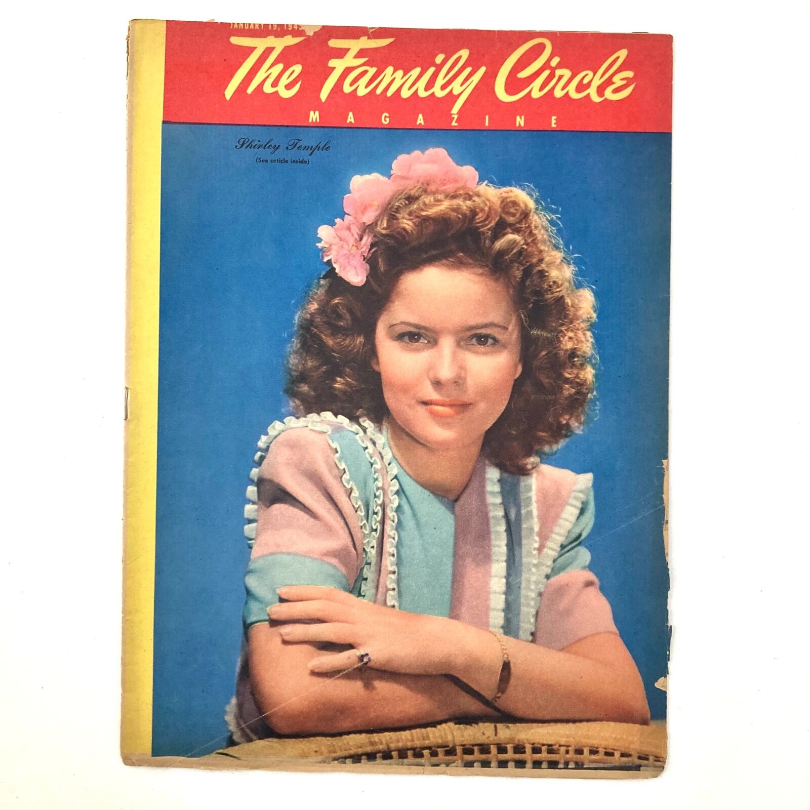 Cover of VTG The Family Circle Magazine January 19, 1945 featuring Shirley Temple in a colorful dress with a flower in her hair.