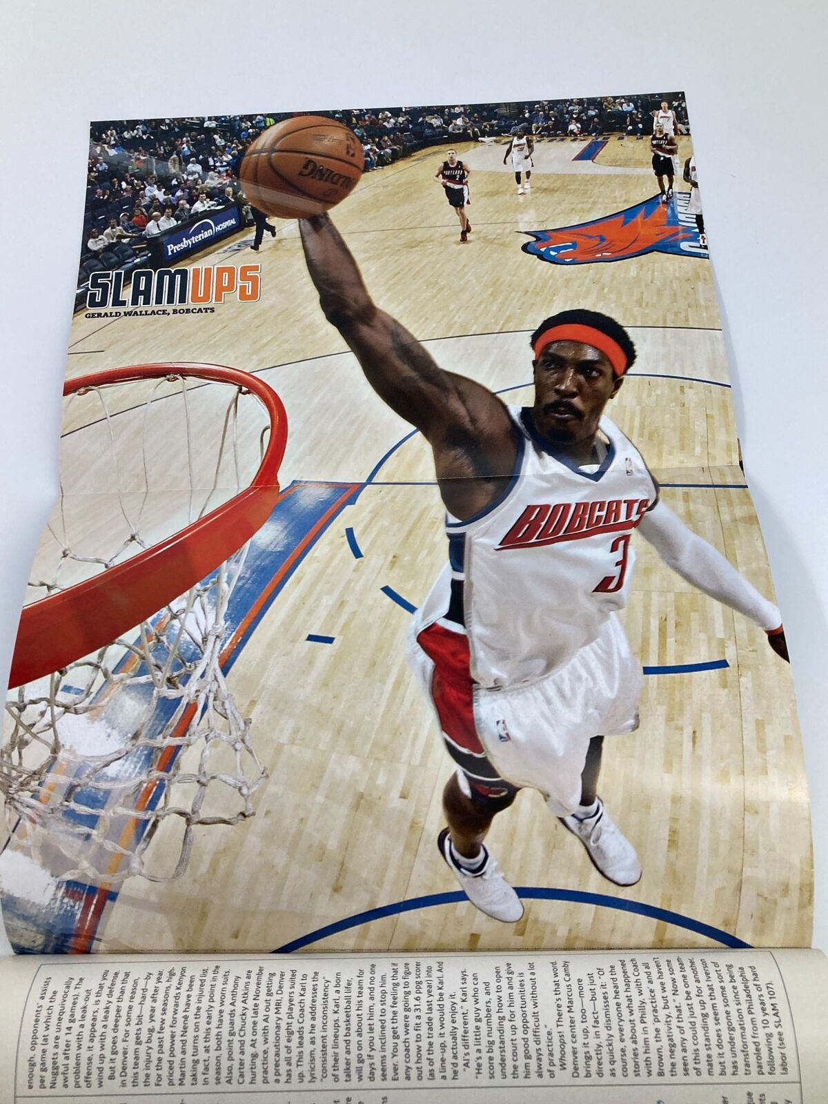 Slam Magazine March 2008 NBA poster showcasing a dynamic action shot of Allen Iverson making a slam dunk, capturing the excitement of basketball.