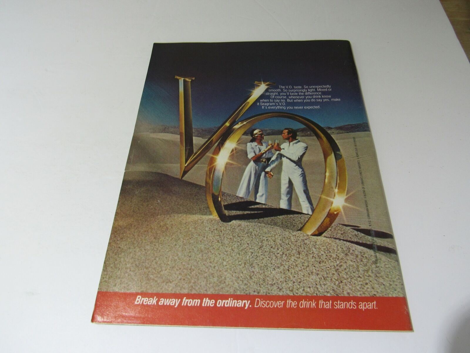 Back cover of People Weekly Magazine from March 7, 1983, showcasing a promotional image with a striking golden 'V' and a desert backdrop.