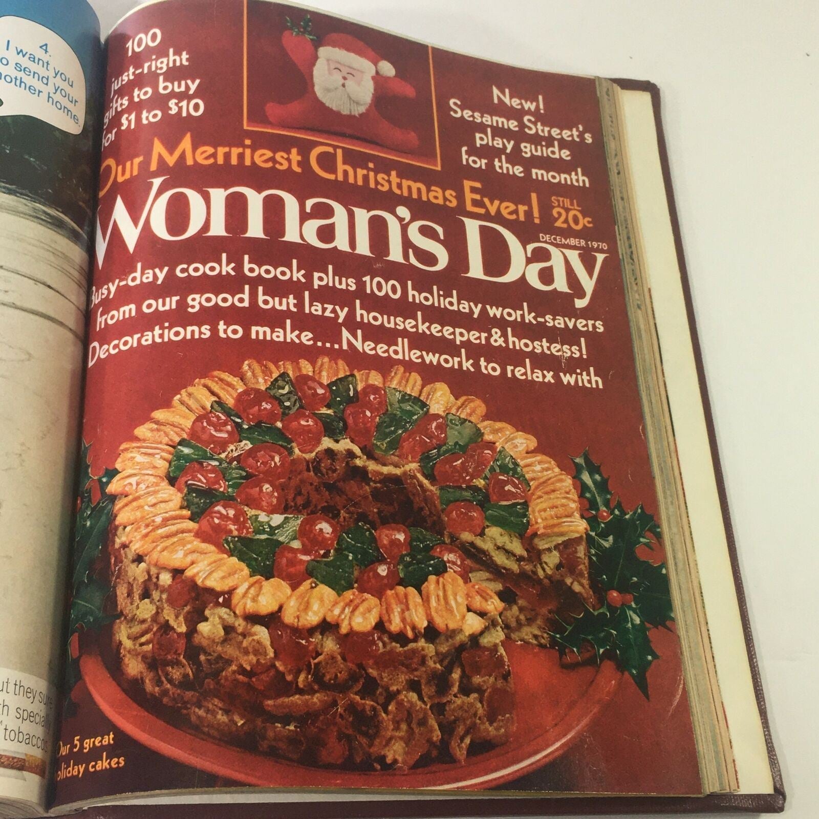 Cover of the 1970 Woman's Day Magazine featuring a festive Christmas theme with a holiday cake, showcasing 'Our Merriest Christmas Ever!' and tips for busy housekeepers.