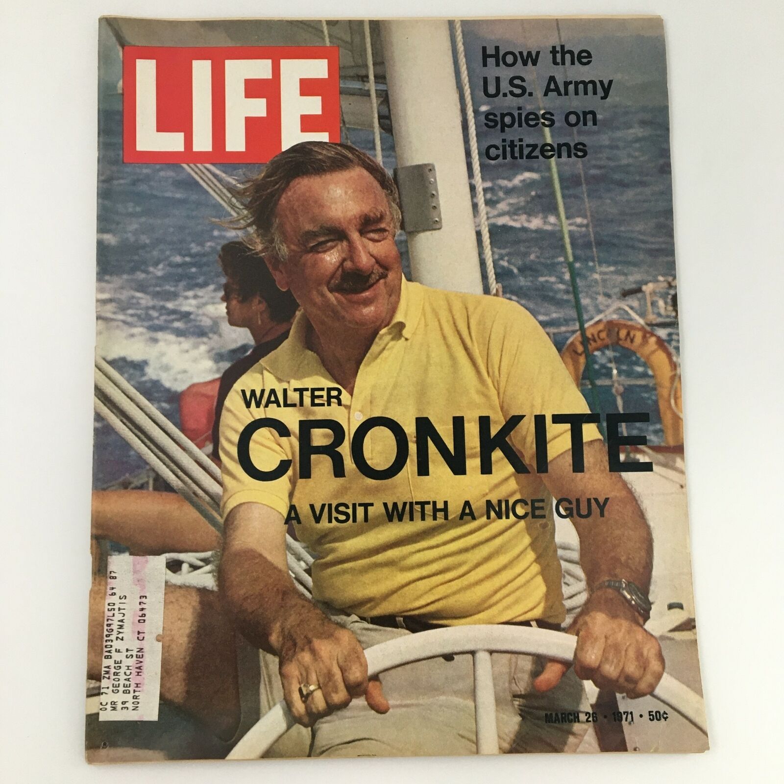 Vintage Life Magazine cover featuring Walter Cronkite, March 26, 1971, showcasing the iconic broadcaster in a yellow shirt, aboard a boat with a scenic ocean background.