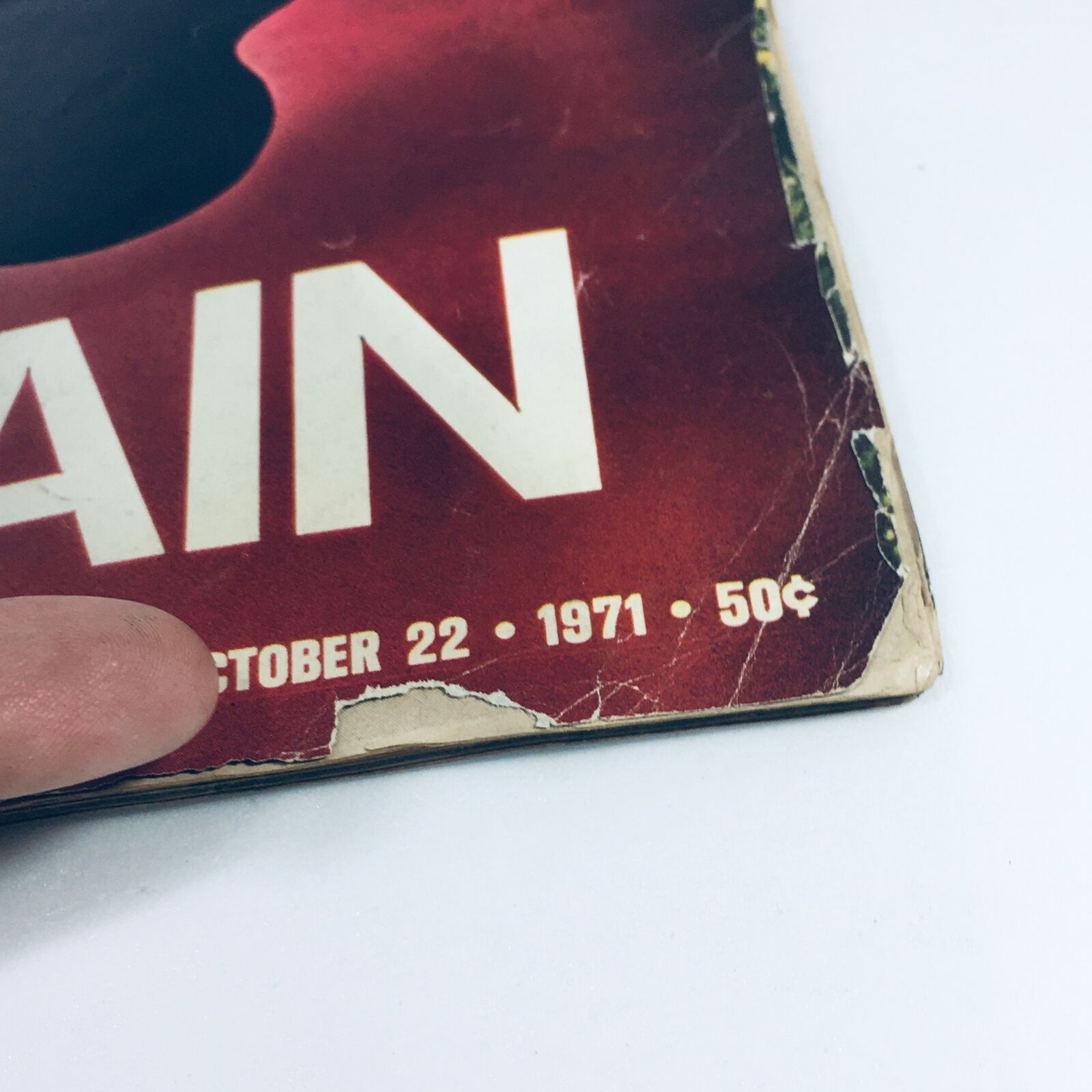 Close-up of the bottom corner of the VTG Life Magazine October 22 1971 cover showing the date and price, emphasizing its vintage appeal.