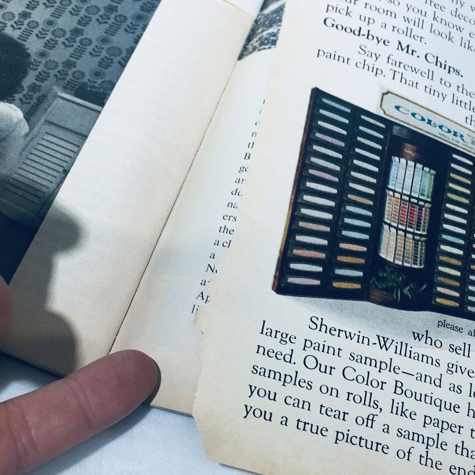 Interior page of VTG Life Magazine April 14 1972 showing a sample of paint colors with a finger pointing at the torn edge, indicating wear, reflecting the vintage condition of the magazine.