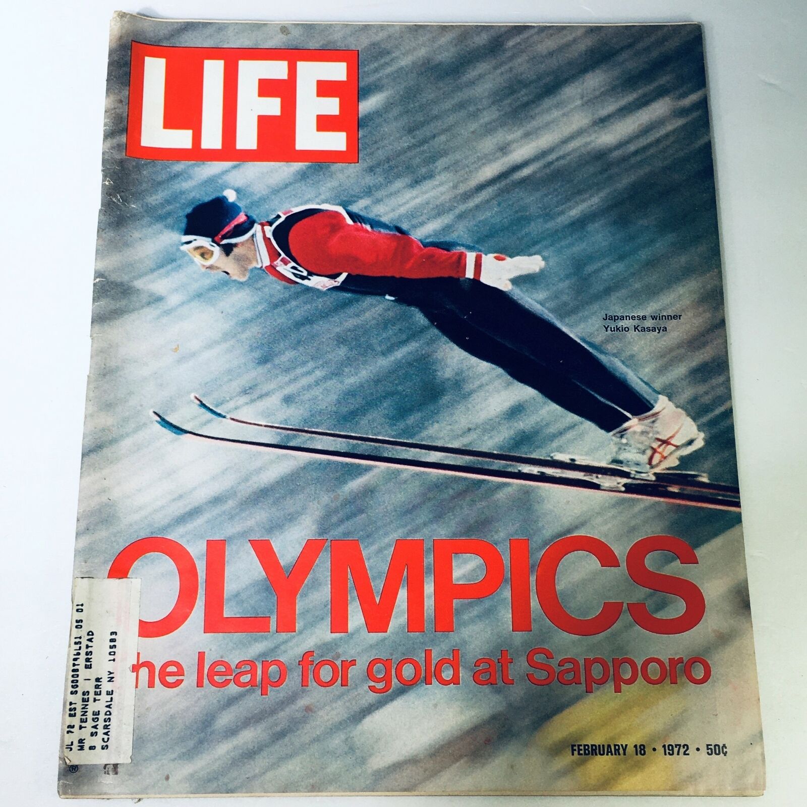 Cover of VTG Life Magazine from February 18, 1972, featuring the Olympics and Japanese ski jumping winner Yukio Kasaya, showcasing the thrilling moment of ski jumping with a vibrant design.
