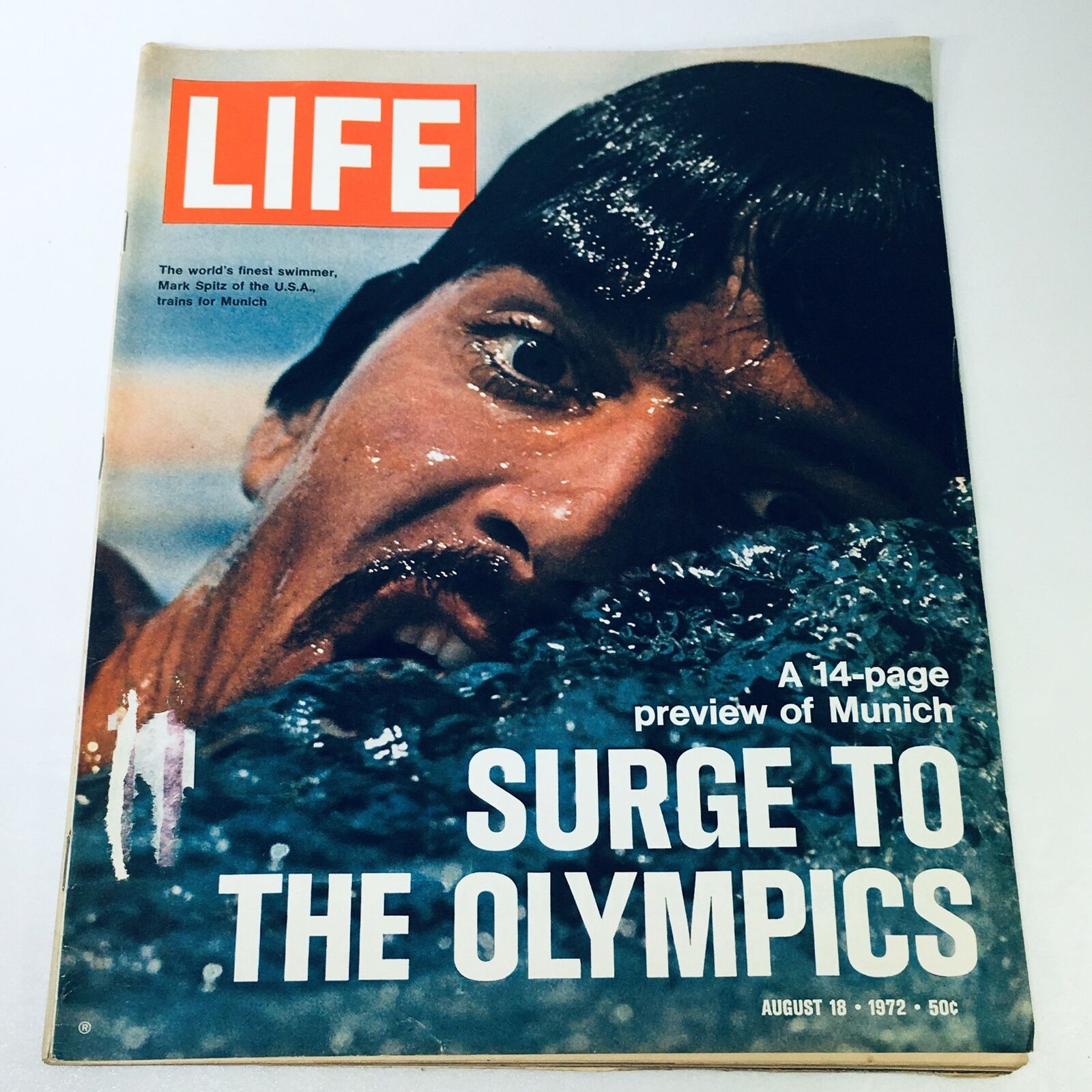 Cover of VTG Life Magazine from August 18, 1972, featuring a dramatic close-up of swimmer Mark Spitz with water splashes, highlighting a 14-page preview of the Surge Olympics.