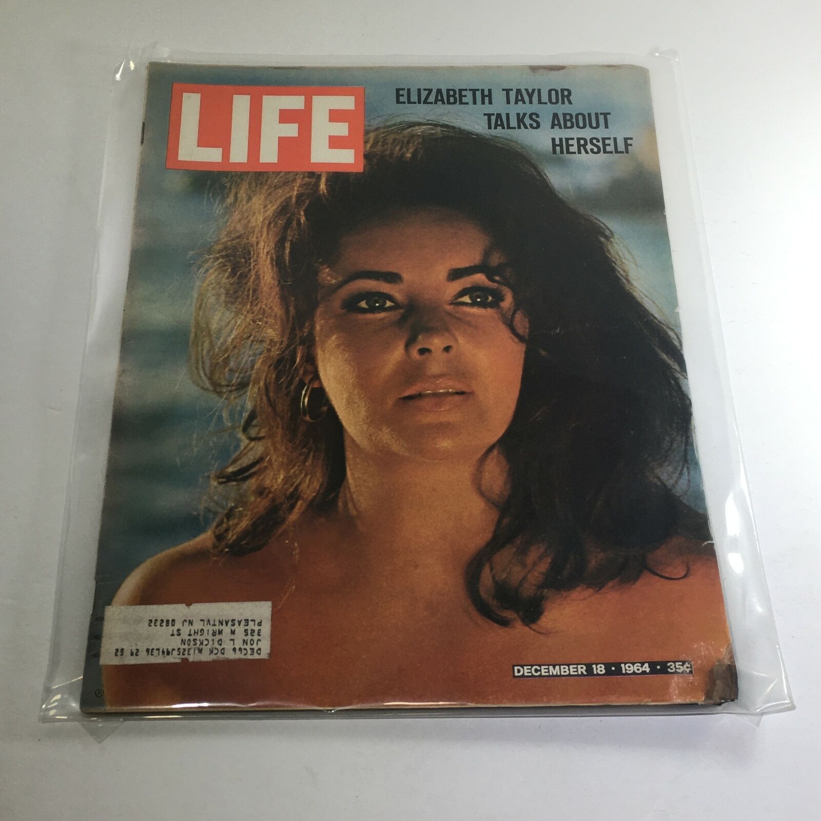 Cover image of VTG Life Magazine from December 18, 1964 featuring Elizabeth Taylor, showcasing her striking beauty and iconic status, along with the statement 'Talks About Herself'.