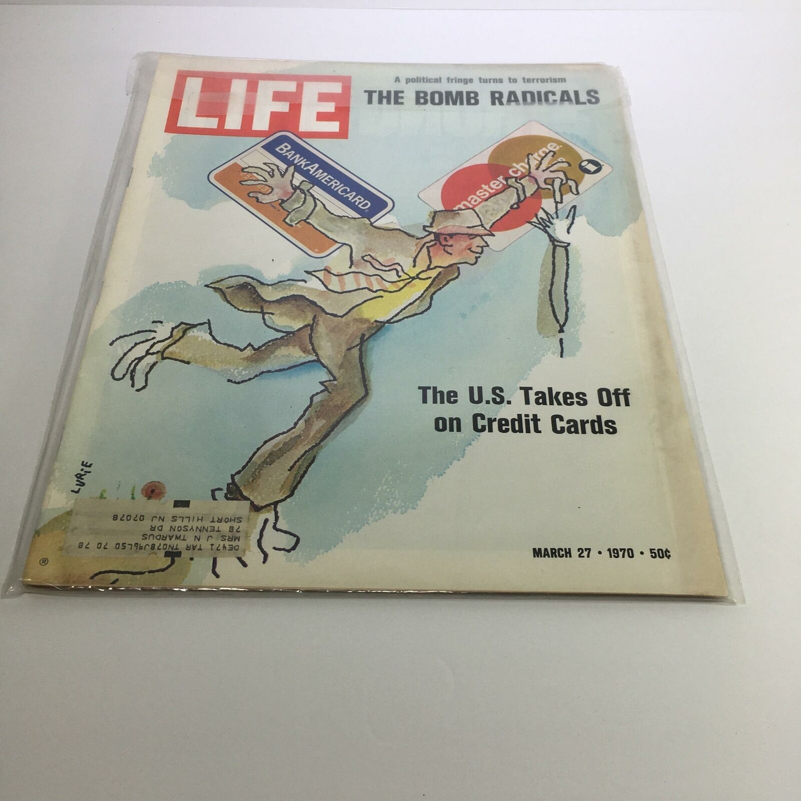 Cover of Life Magazine March 27, 1970, featuring the illustration titled 'The Bomb Radicals' with credit cards, highlighting the rise of consumer culture in the U.S.