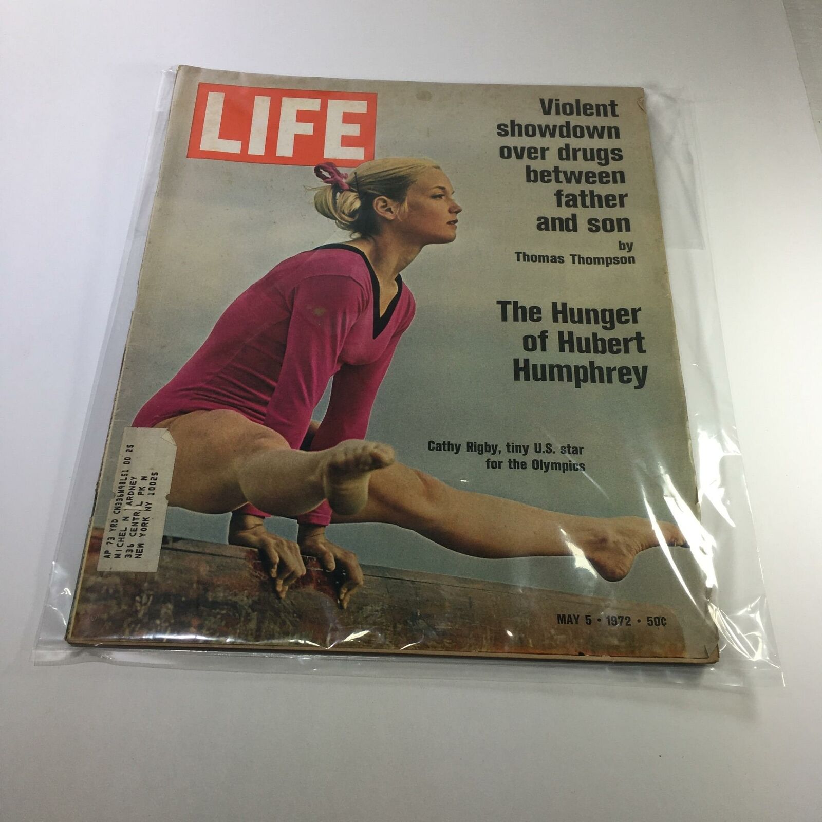 Life Magazine cover from May 5, 1972 featuring Cathy Rigby, a tiny U.S. star for the Olympics, in a pink athletic outfit showcasing a gymnastic pose. The cover also includes articles about a violent showdown over drugs and Hubert Humphrey.