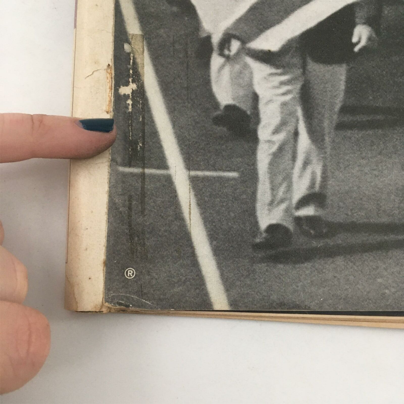 Close-up view of the edge of the September 15, 1972 Life Magazine, showcasing minor wear and imperfections, relevant to the 'Olympic Tragedy' issue about the Israeli team's loss.