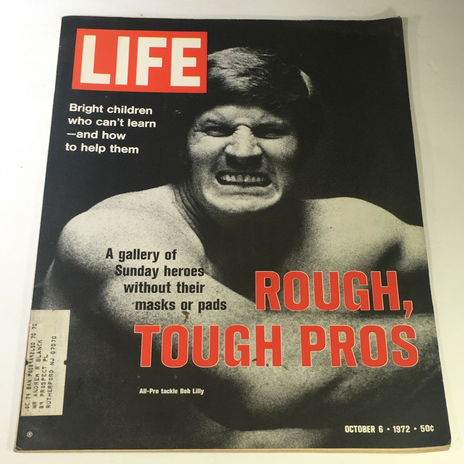 VTG Life Magazine from October 6, 1972 featuring Bob Lilly, an All-Pro tackle, displaying a fierce expression on the cover. The magazine's title, 'LIFE,' along with the subtitle 'ROUGH, TOUGH PROS,' highlights the focus on resilient athletes.