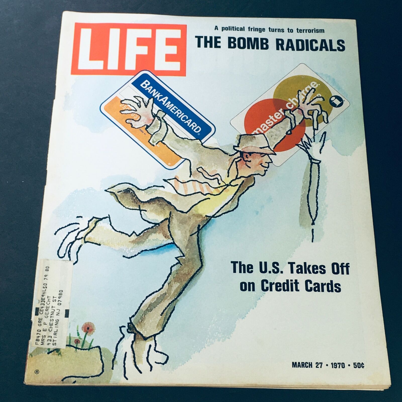Cover of VTG Life Magazine March 27 1970 featuring the title 'Political Fringe Turns Terrorism Bomb Radicals' with illustrations related to credit cards and political themes.