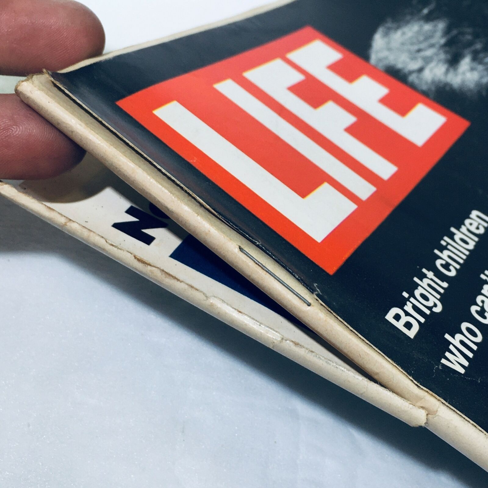 Side view of the VTG Life Magazine October 6 1972, highlighting the binding condition and wear on the edges.