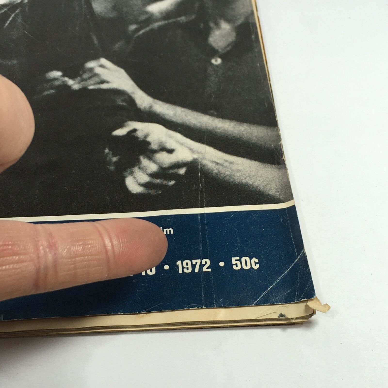 Close-up view of the bottom section of VTG Life Magazine November 10 1972 showing the publication date, price, and a pointed finger indicating the details.