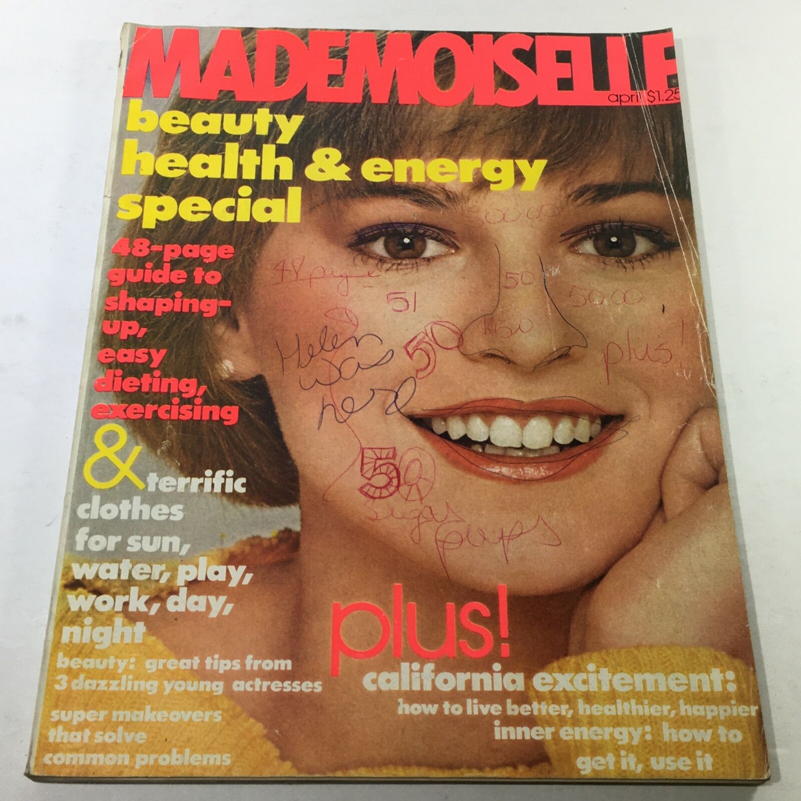 Cover of VTG Mademoiselle Magazine from April 1977 featuring a smiling woman with highlighted text indicating a beauty and health special. The nostalgic design includes references to fashion, exercise, and diet trends of the 1970s.
