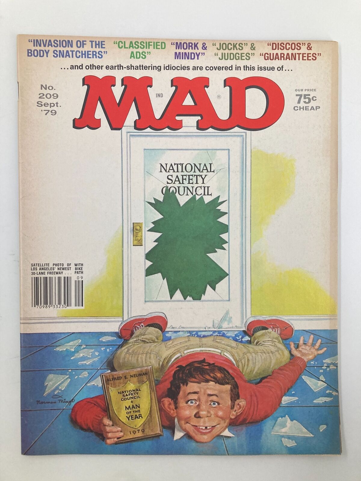 Cover of Mad Magazine September 1979 Issue No. 209 featuring National Safety Council theme, with Alfred E. Neuman and humorous illustration depicting comedic elements of the late 1970s.
