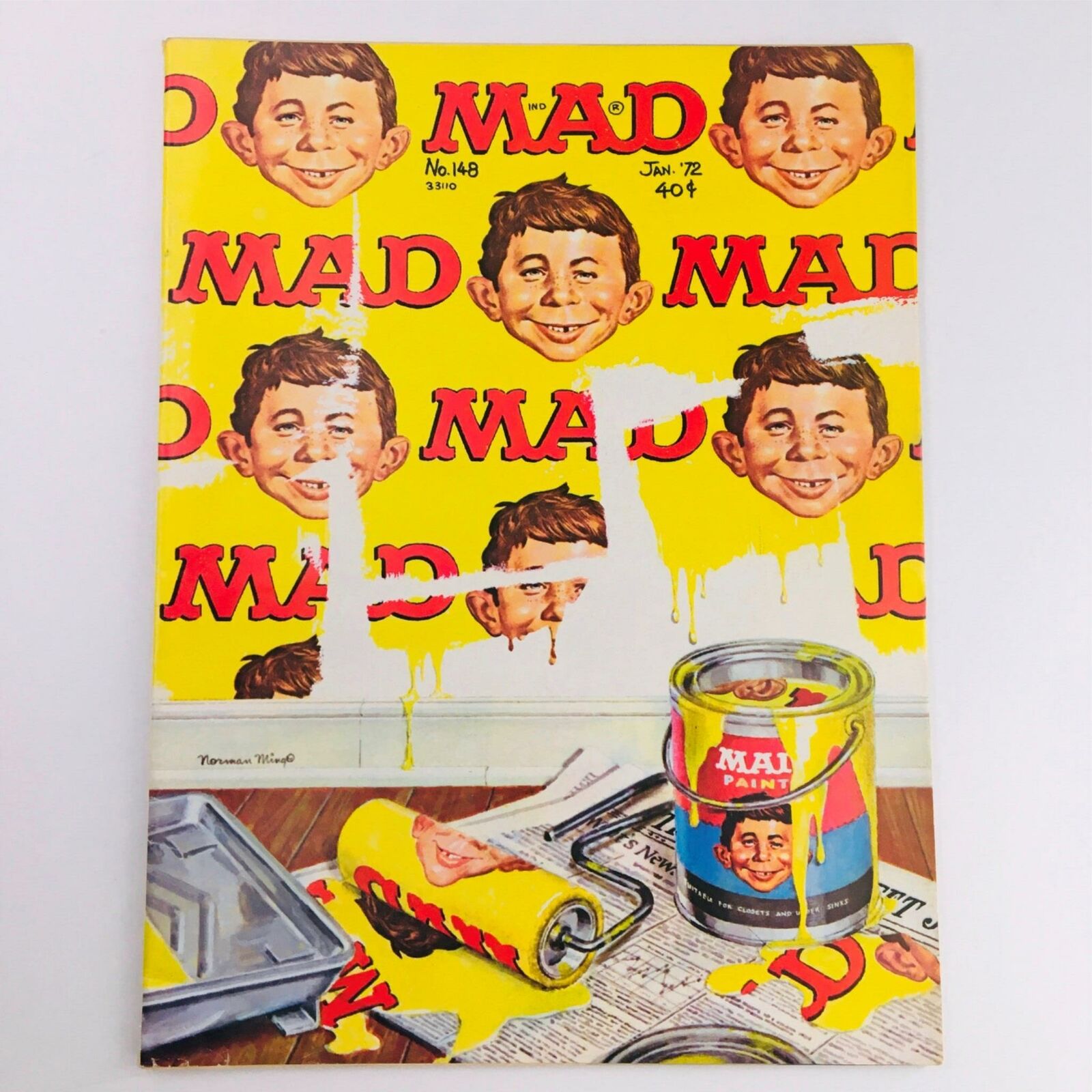 Cover of Mad Magazine January 1972 No. 148, featuring bright yellow background with repeated images of a smiling boy's face, a paint can labeled 'Mad Paint', and paint roller on a wooden floor, reflecting the whimsical humor and nostalgic charm of the magazine.