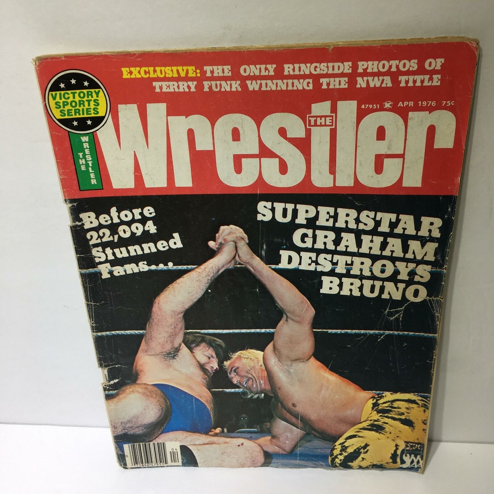 The Wrestler Magazine April 1976 cover featuring the headline 'Superstar Graham Destroys Bruno' with an illustration of a wrestling match.
