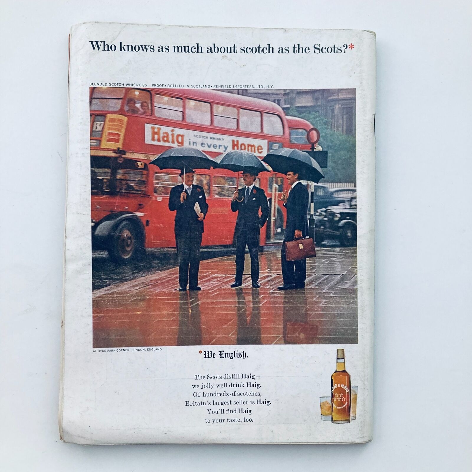 Back cover of Playboy Magazine September 1965, displaying an advertisement for Haig blended scotch whisky with a rainy London street scene and businessmen under umbrellas.