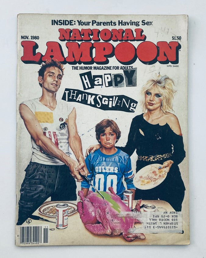 Cover of Vtg National Lampoon Magazine Nov 1980 Vol 2 No 28 featuring Thanksgiving humor, showcasing three characters—two adults and a child—with a humorous Thanksgiving theme and a large turkey.