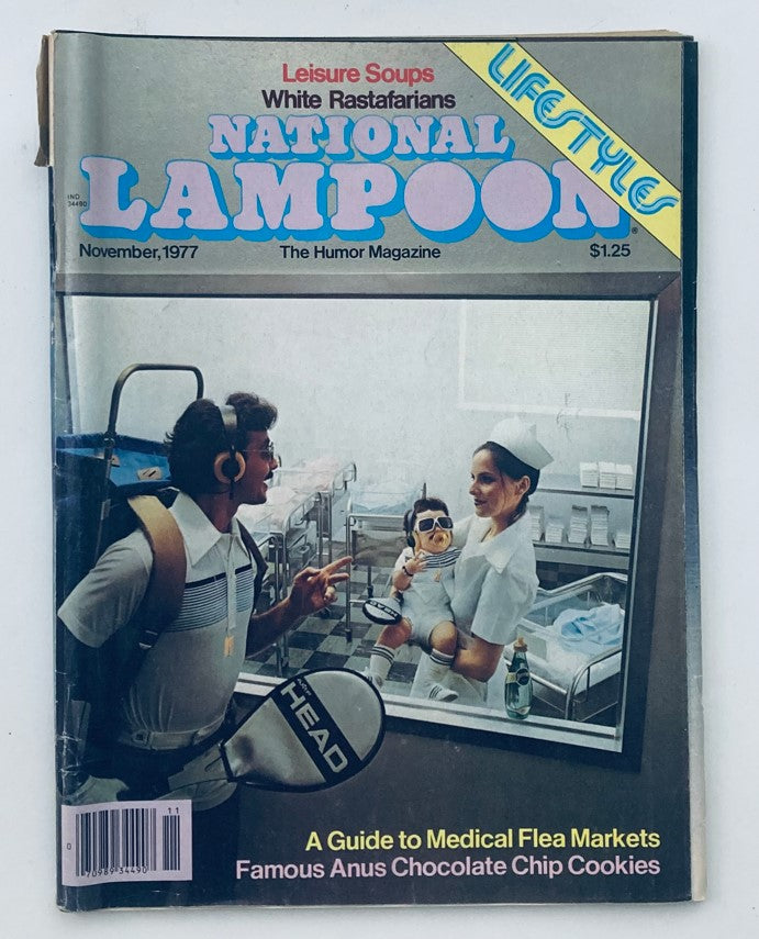 Cover of the Vtg National Lampoon Magazine from November 1977 featuring articles on Medical and Flea Markets. The cover includes humorous illustrations and the title prominently displayed.