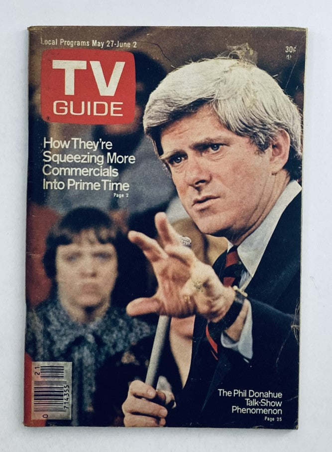 Cover of TV Guide Magazine from May 27, 1978 featuring Phil Donahue, highlighting the topic of increased commercials during prime time. The image portrays a serious Donahue engaging with an audience, with the title 'TV Guide' prominently displayed.