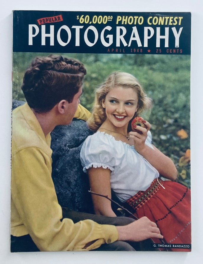 VTG Popular Photography Magazine April 1948 cover featuring a vibrant color illustration of a young couple outdoors, highlighting the theme 'Glamour in Glass'.